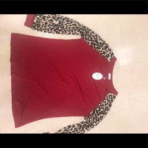 Red long sleeve top with leopard print sleeves